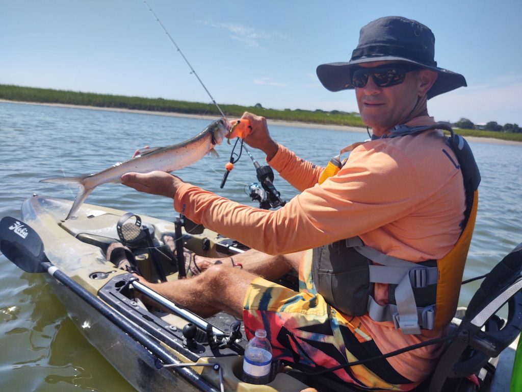 Angler shows off ladyfish catch