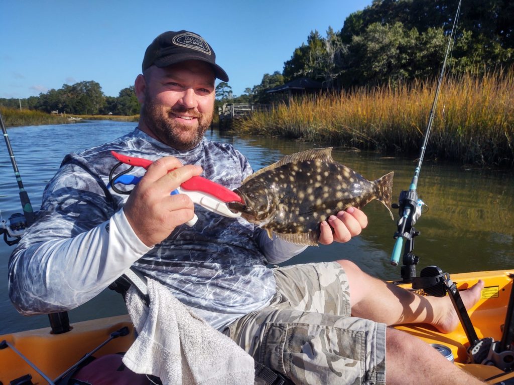 Kayak angler shows off flounder