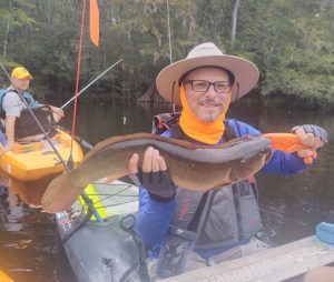 angler with bowfin